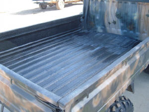 Picture of mini truck with Spray in Bedliner